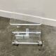 Vintage Lucite magazine cart, 1980s