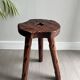 Wooden tripod stool