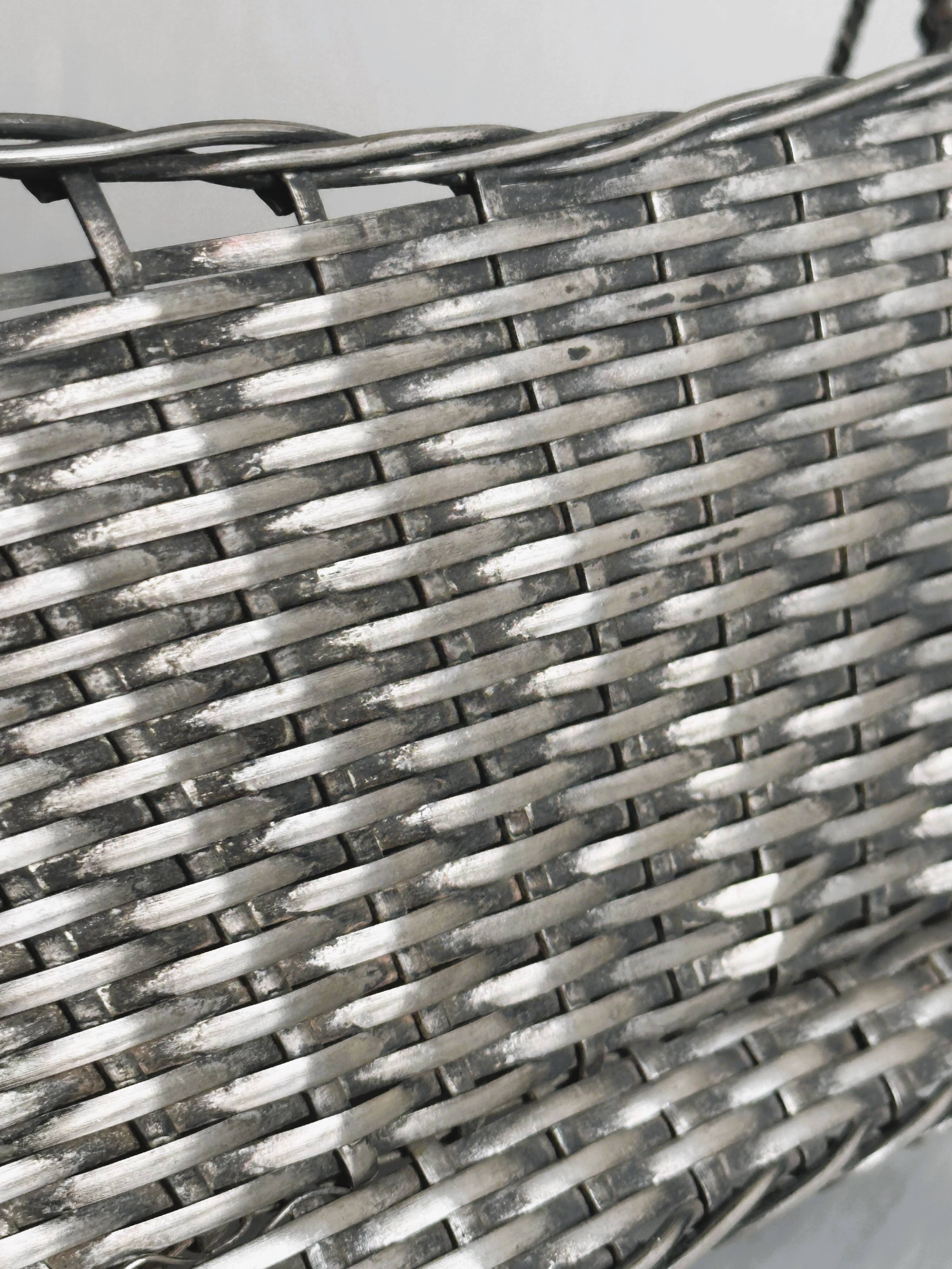 Woven metal wine basket