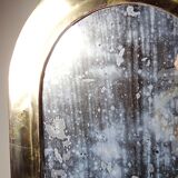 Large vintage Moroccan artisan wall mirror from the 50s-70s, made of solid brass, arch-shaped.