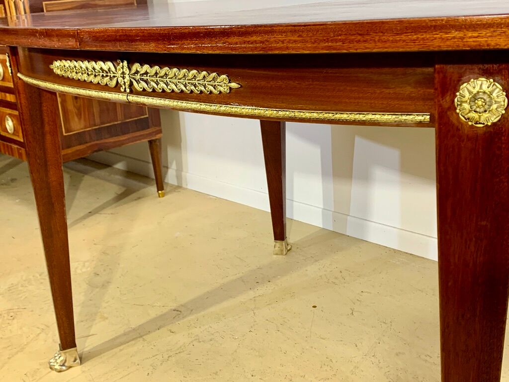 Oval mahogany table Empire style