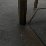 1940s octagonal coffee table with a marble top.