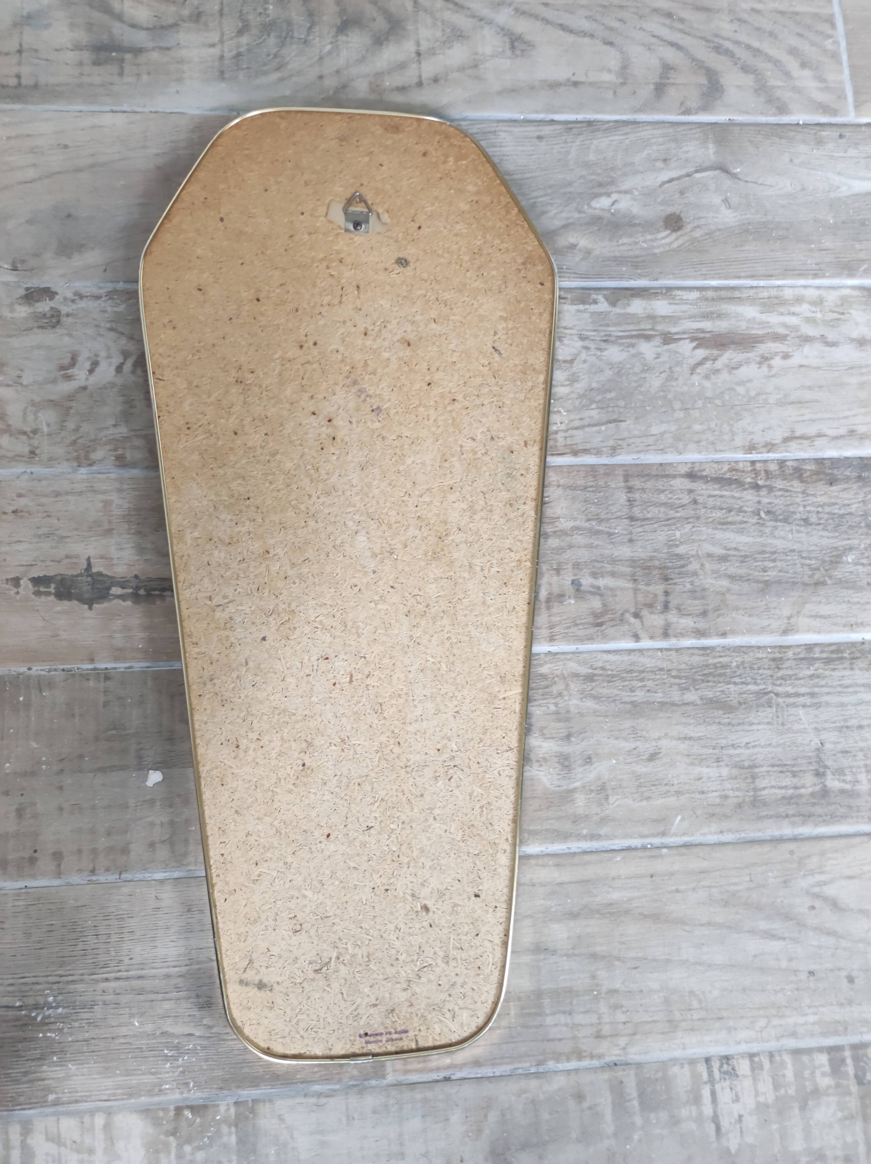 Asymmetrical mirror free-form rearview mirror