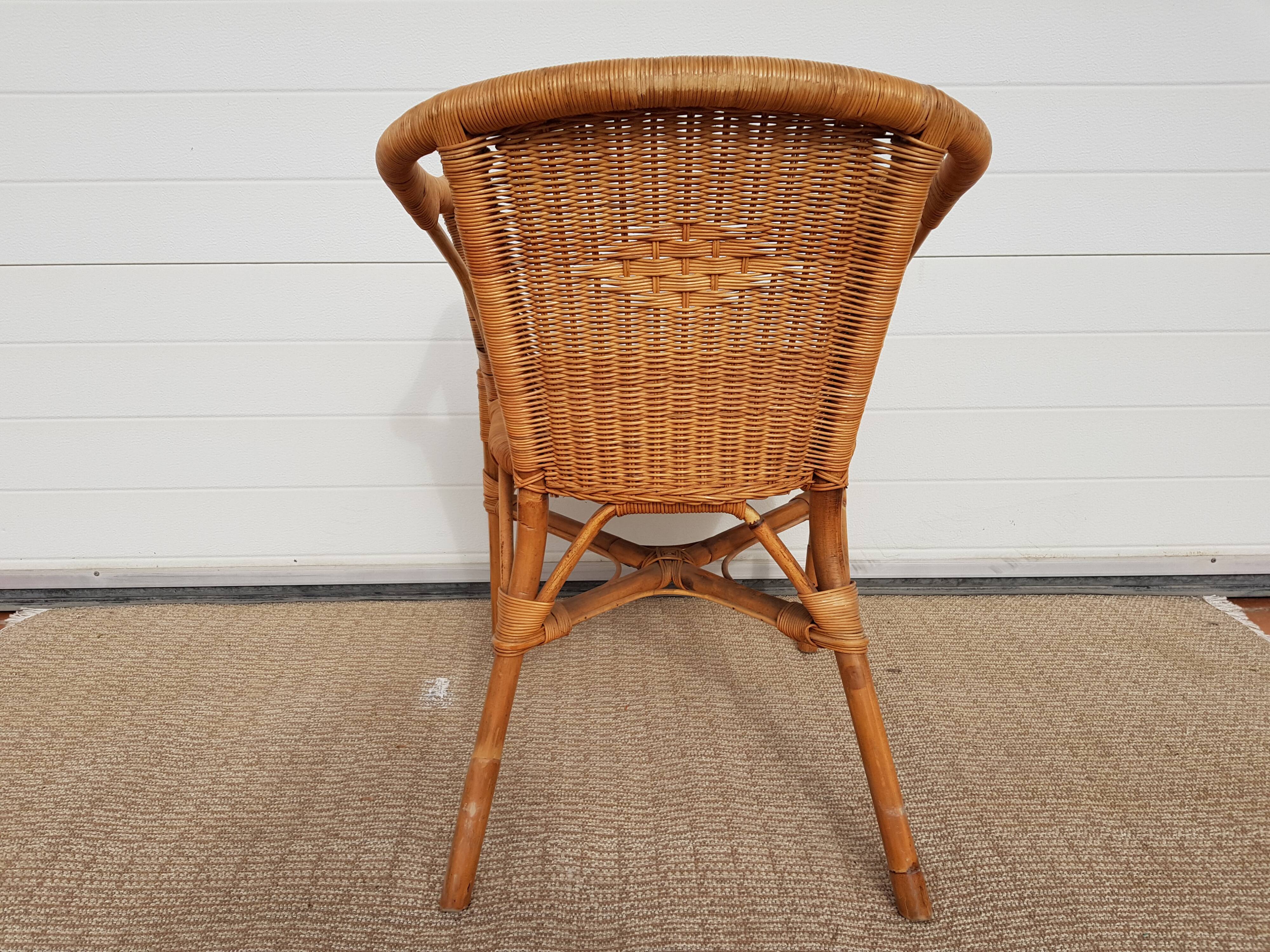 Old chair in bamboo 60s