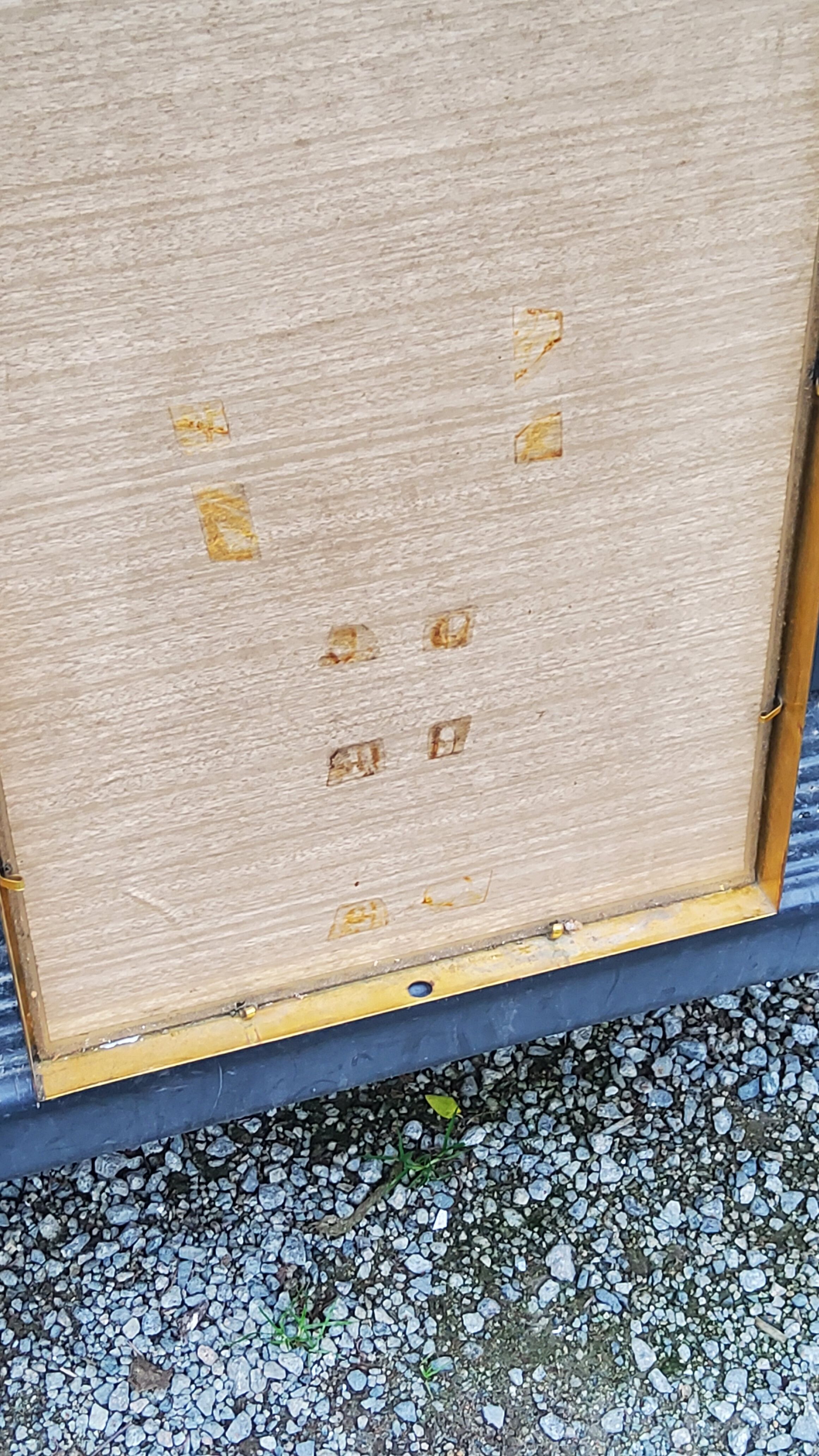 Mirror of the 70s in gilded metal, 60x35 cm