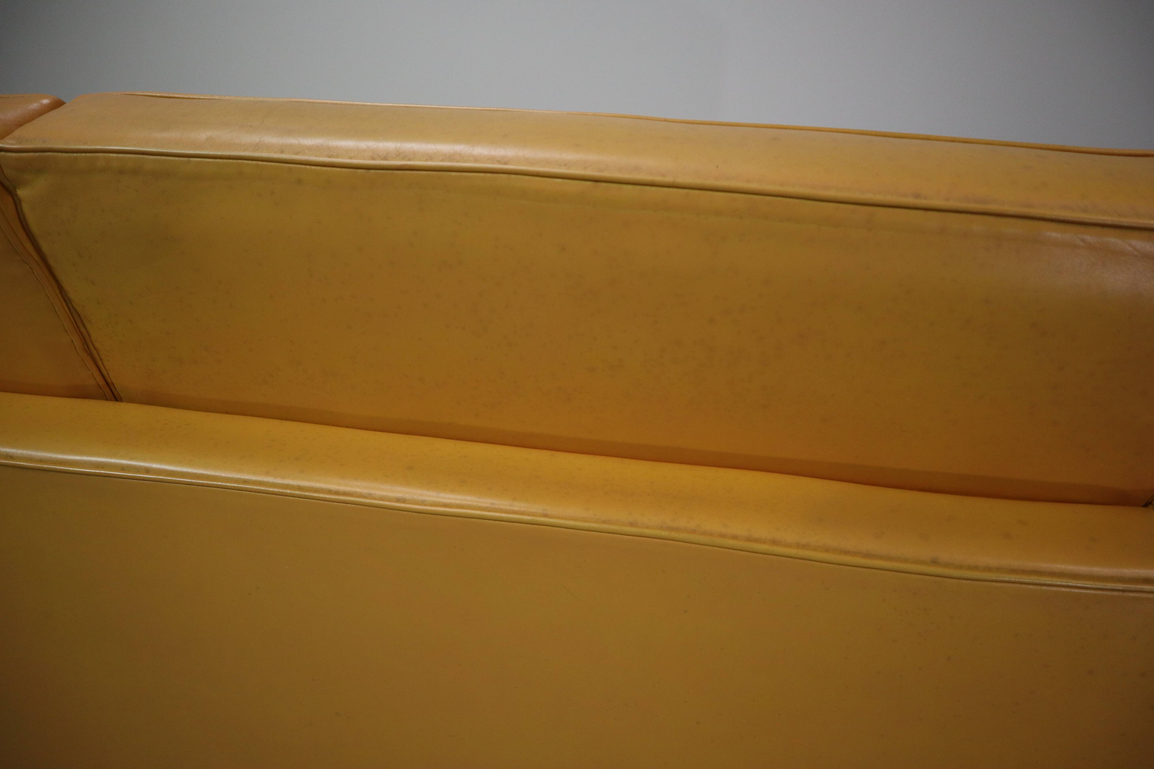 Florence Knoll two-seater sofa in mustard yellow leather, 1970