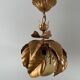 Suspension flowers golden leaves with glass globe