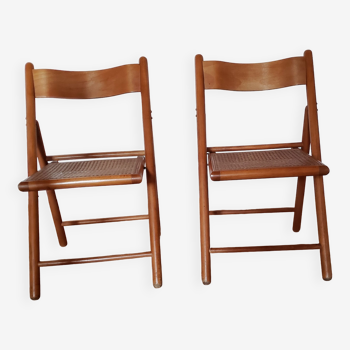 Pair of vintage canned folding chairs