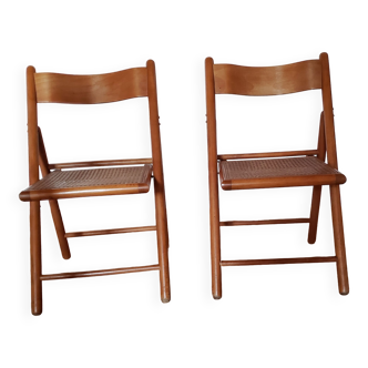 Pair of vintage canned folding chairs