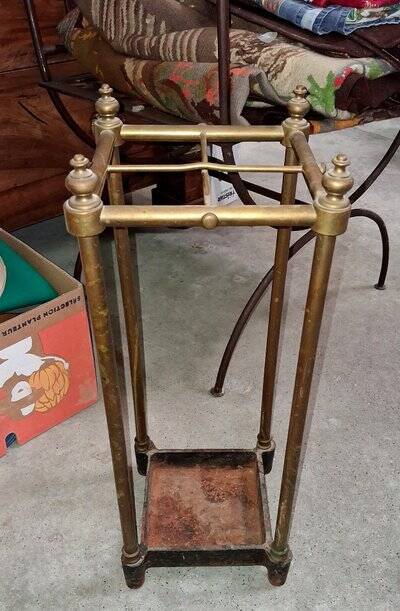 Brass and copper umbrella stands, early 20th century.