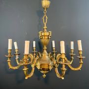 Important bronze chiseled chandelier in Louis XVI style with 8 light arms by Lucien Gau.