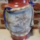 Paire de vases en barbotine