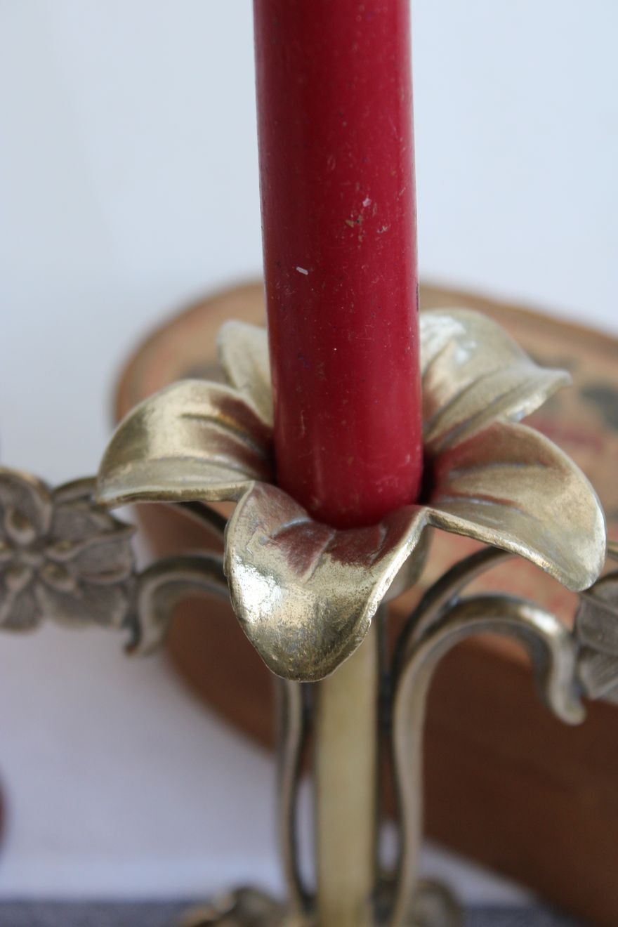 Golden metal stand candle holder