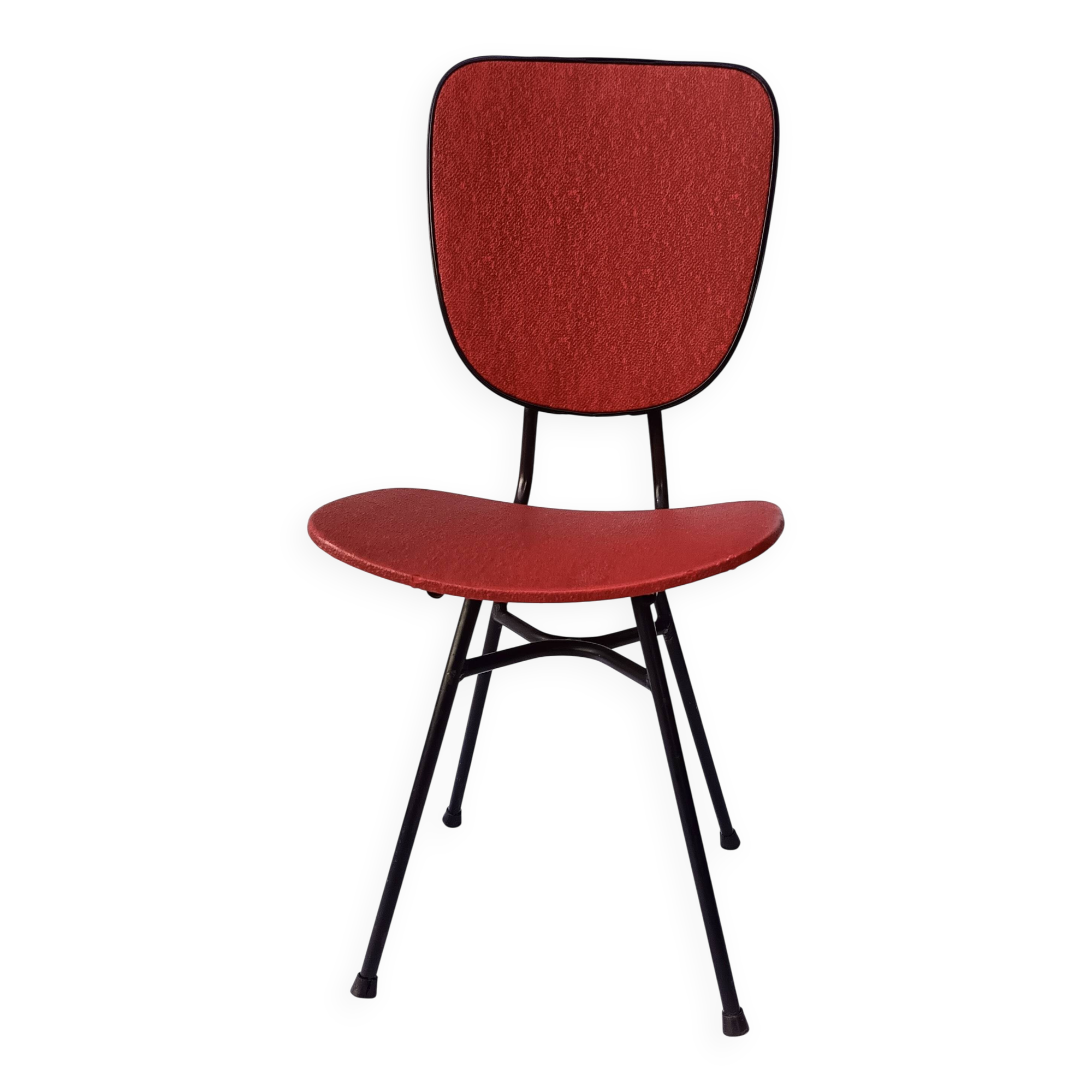 sixties chair with steel tube legs and a skaï seat