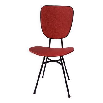 sixties chair with steel tube legs and a skaï seat
