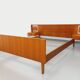 Vintage Scandinavian style double bed in teak from the 60s with integrated bedside lights