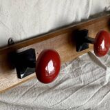 Wall-mounted coat rack with 3 hooks, vintage 1960s red lacquered metal.