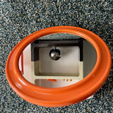 Mirror with round frame in orange molded plastic by carrara & matta, 1974