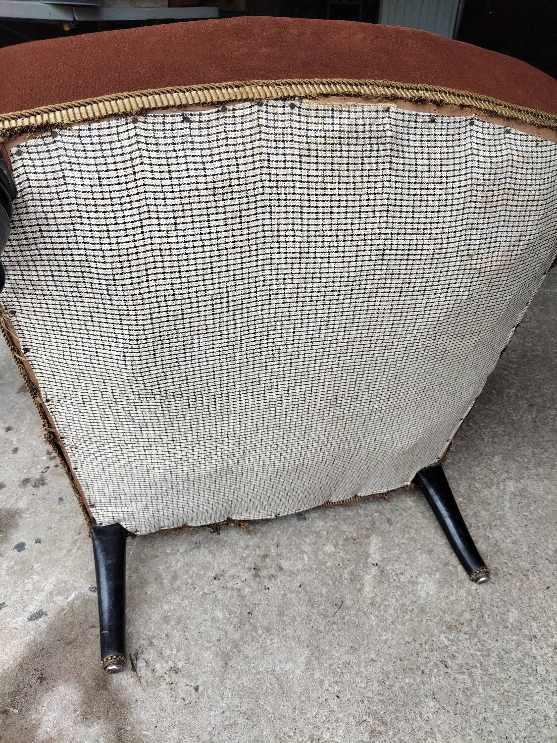 Antique brown velvet tub chair – turned legs and brass rings.