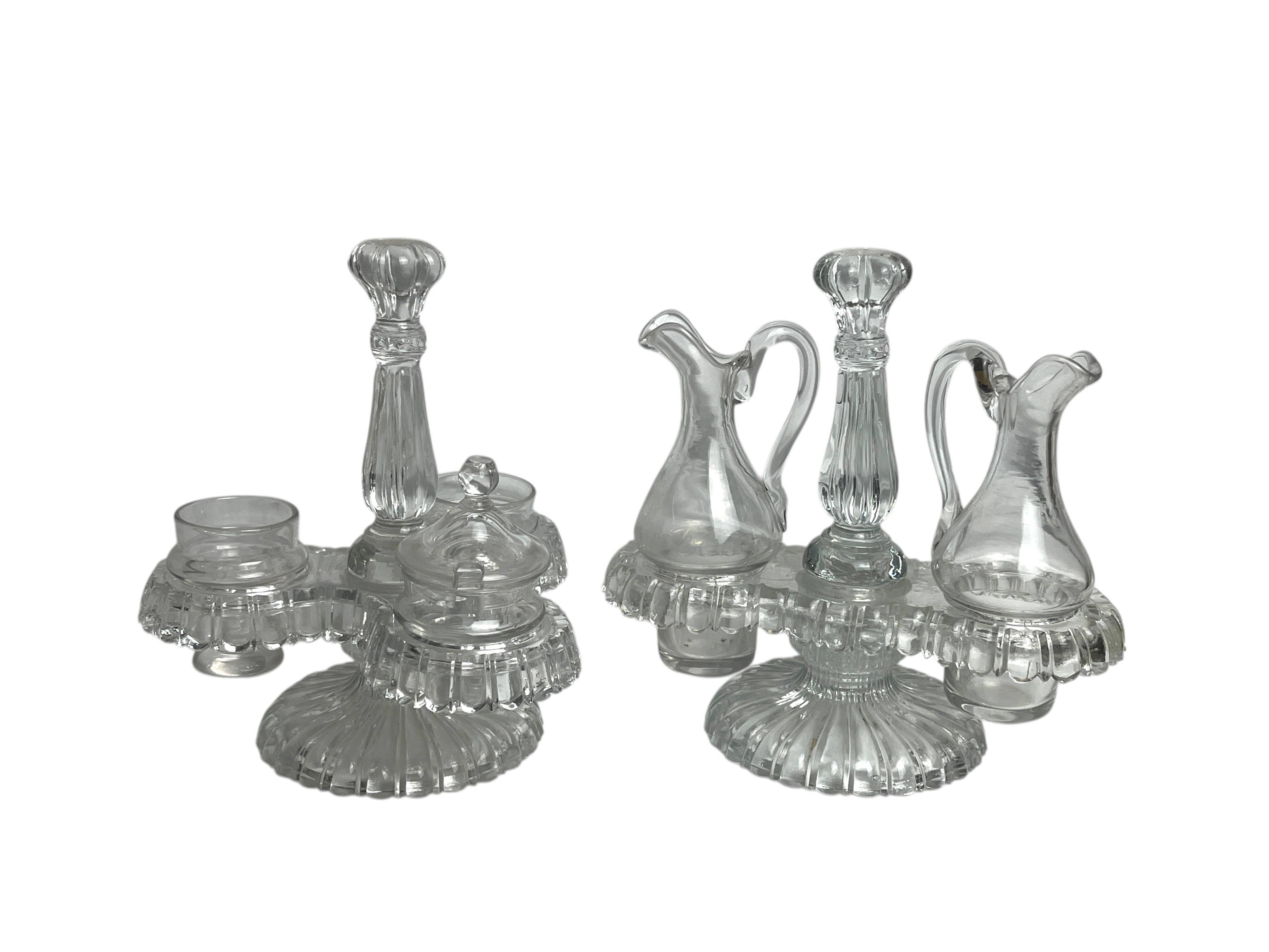 Tableware, two moulded glass table servants from the early 20th century.