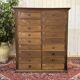 Notary's cabinet with 18 drawers in oak and fir from the early 20th century.
