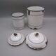 2 antique spice pots in enamelled sheet metal