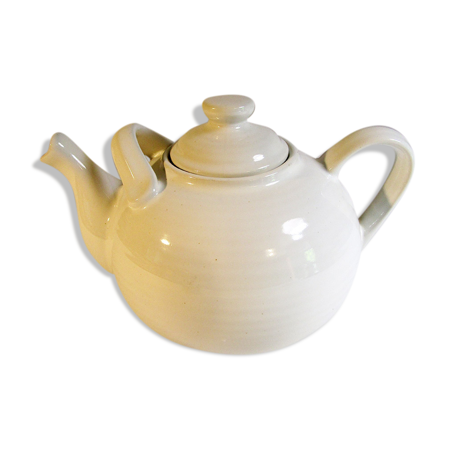 Large white ceramic teapot