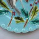 Blue barbotine plate of Sarreguemines: Birds pecking with holly