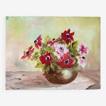 Painting bouquet of anemones in a vase.