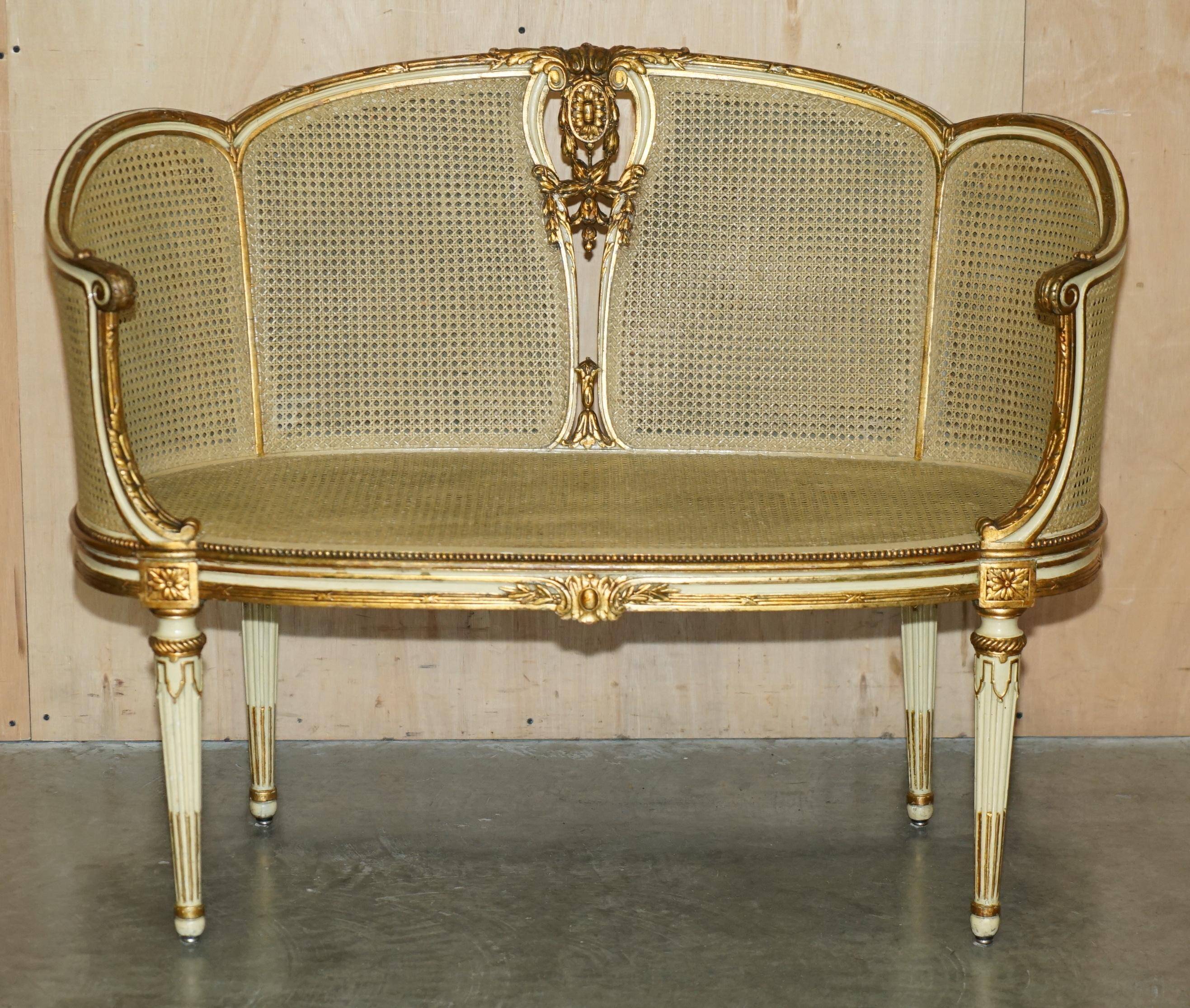 Louis XVI Bergère canapé in gilded wood with double caning