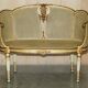 Louis XVI Bergère canapé in gilded wood with double caning
