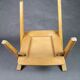 Vintage armchair child feet compass light wood
