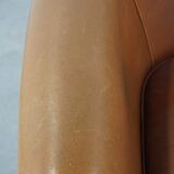 Sheep leather club chair in neutral cognac colour and in good condition