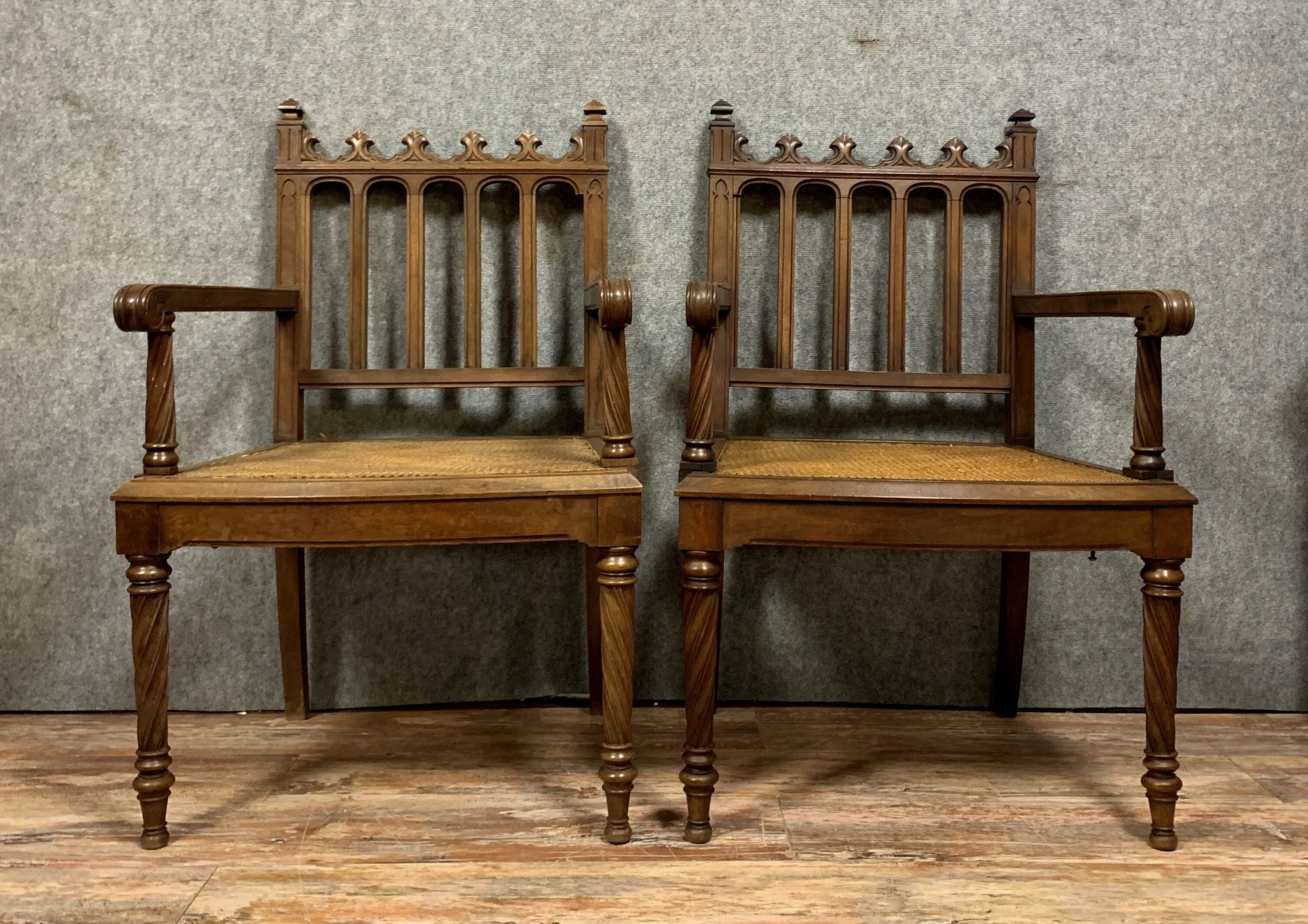 pair of Gothic walnut armchairs circa 1850