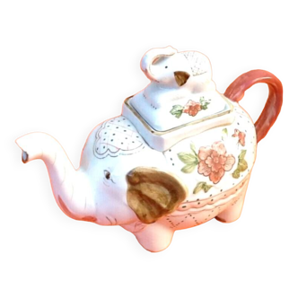White porcelain teapot decorated with peonies elephant shape