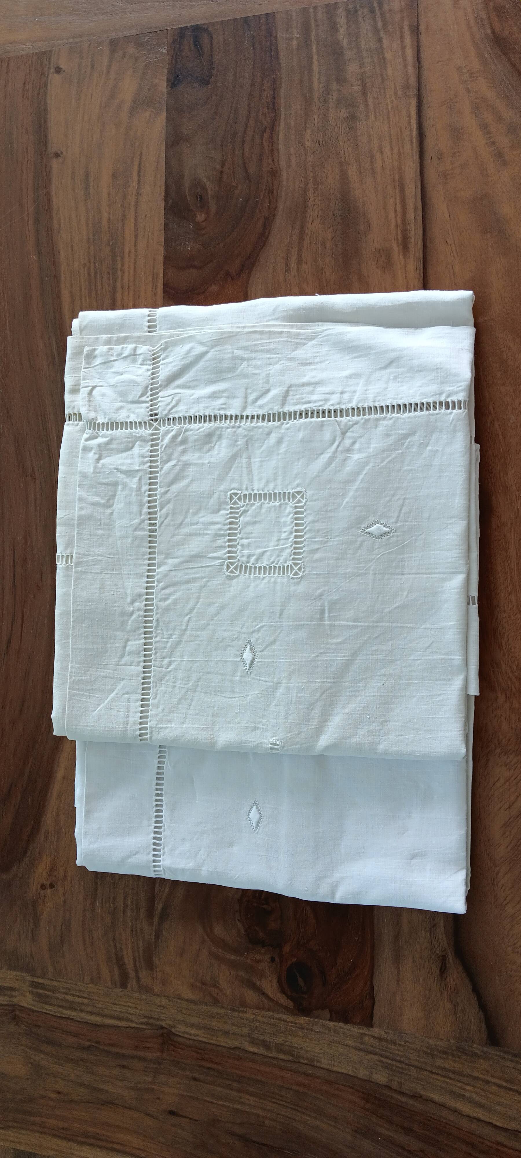 Large vintage white linen embroidered pillowcases (set of 2)