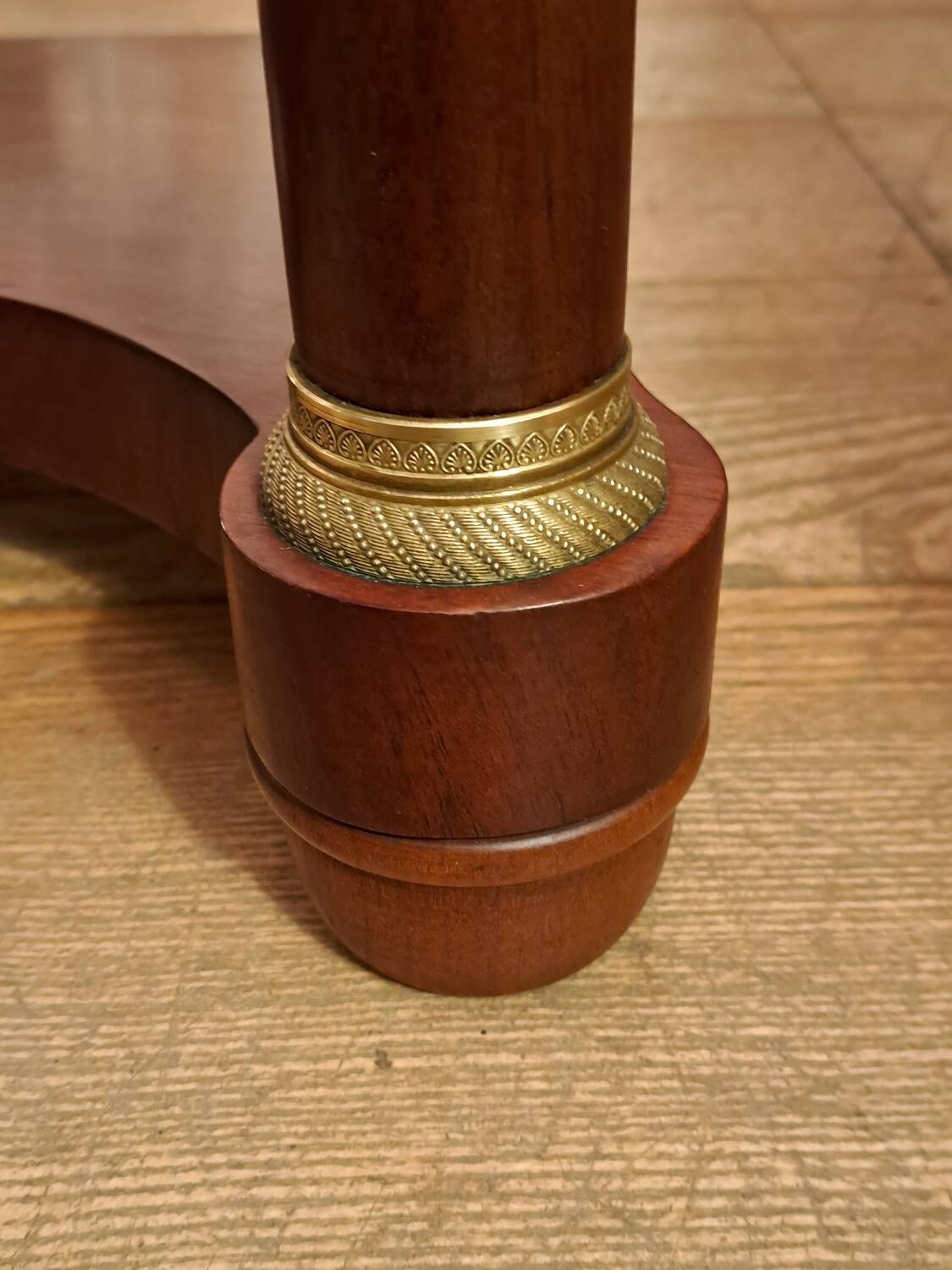 Empire style bedside table in mahogany and bronze