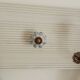 Wall-mounted coat rack 50 cm – 4 hooks and decorative central button
