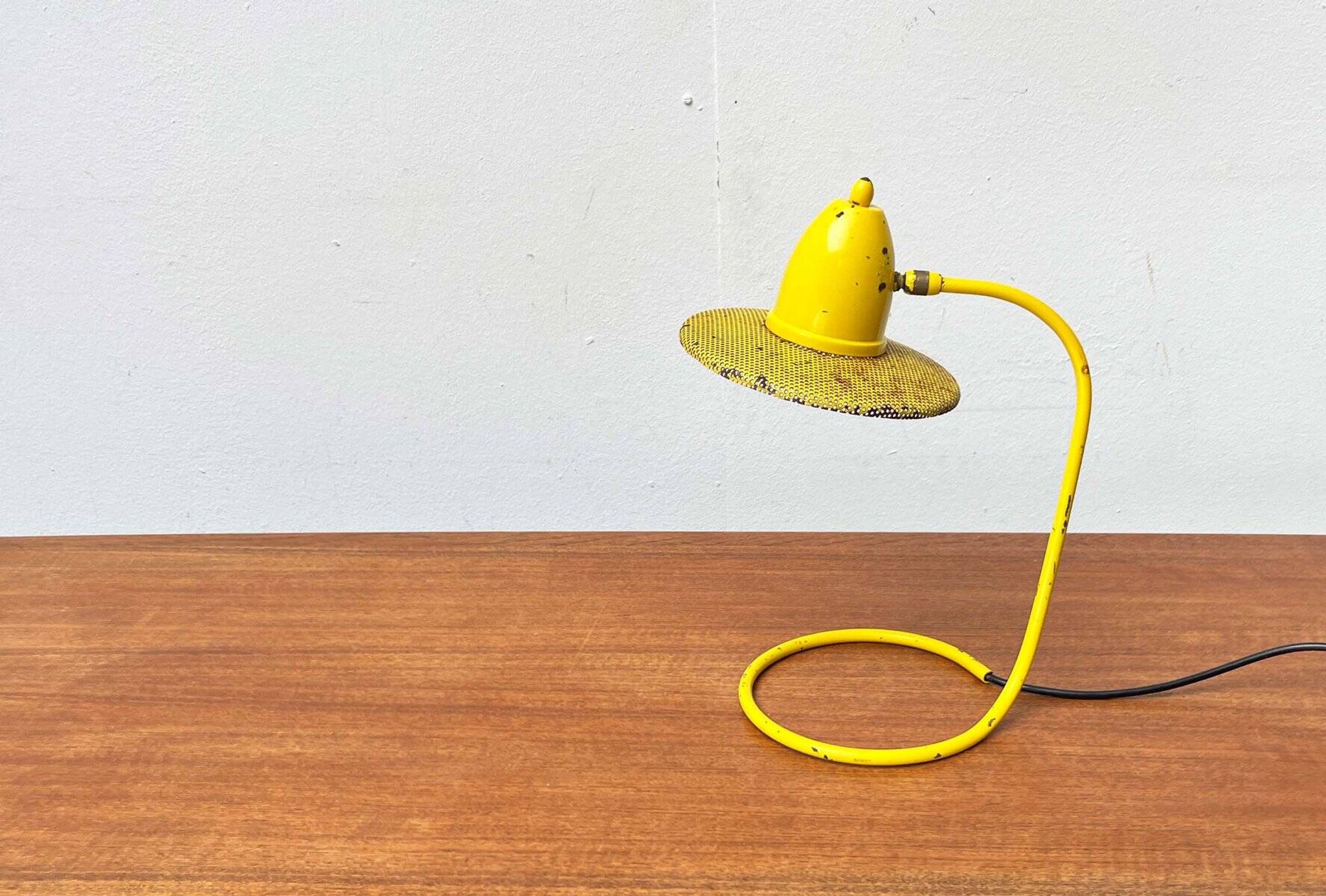 Perforated metal table lamp in Mid-Century Modern style, in the style of Mathieu Matégot, 1960s.