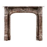 Early nineteenth century French Rouge Royale marble fireplace surround