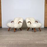 Early pair of arnold madsen clam chairs in curly sheepskin, madsen & schubell, 1944