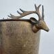 Antique champagne cooler with stag heads
