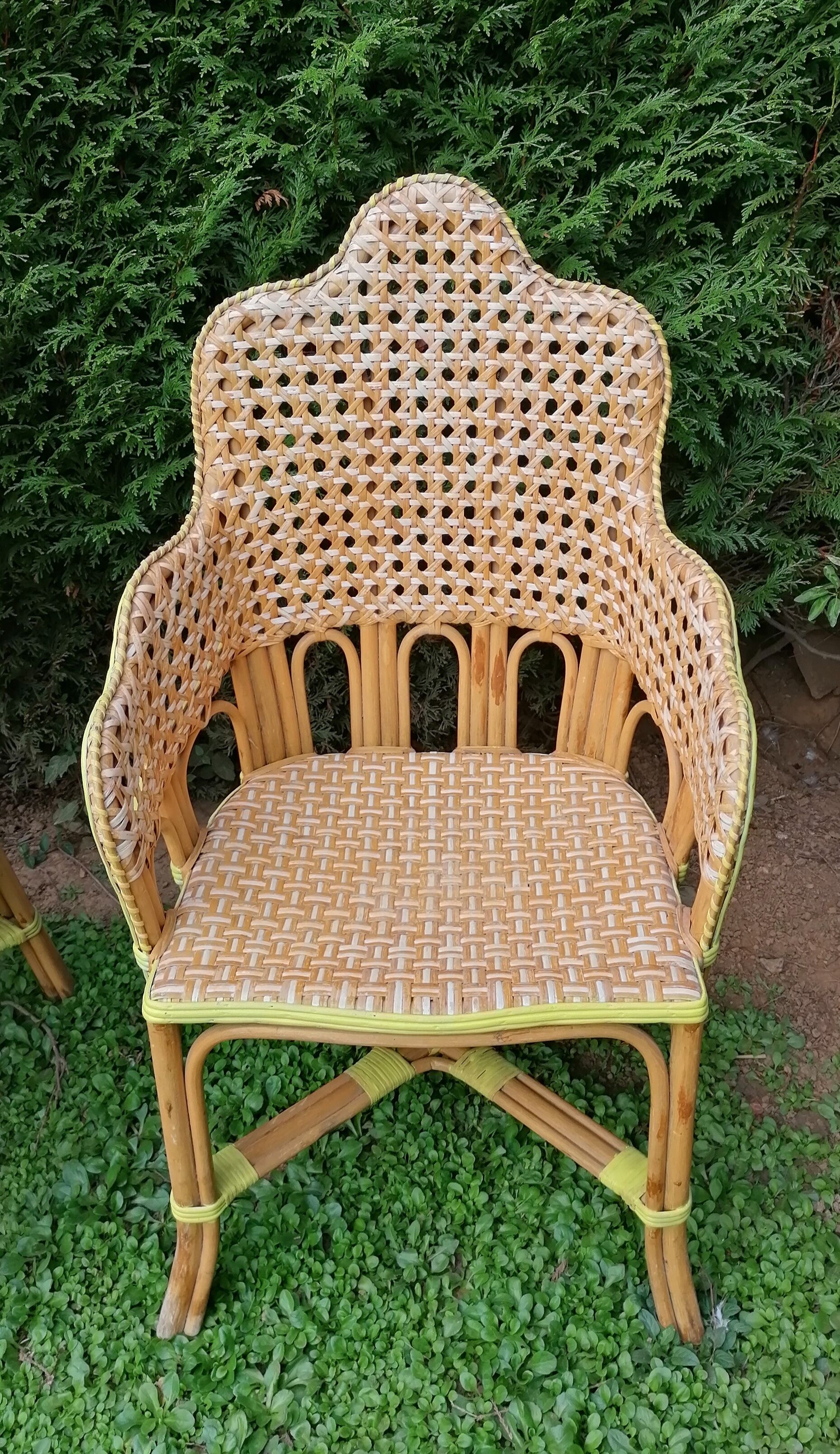 3 woven rattan armchairs