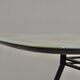 Table à manger italienne avec base en métal et plateau en verre et laiton, années 1950.