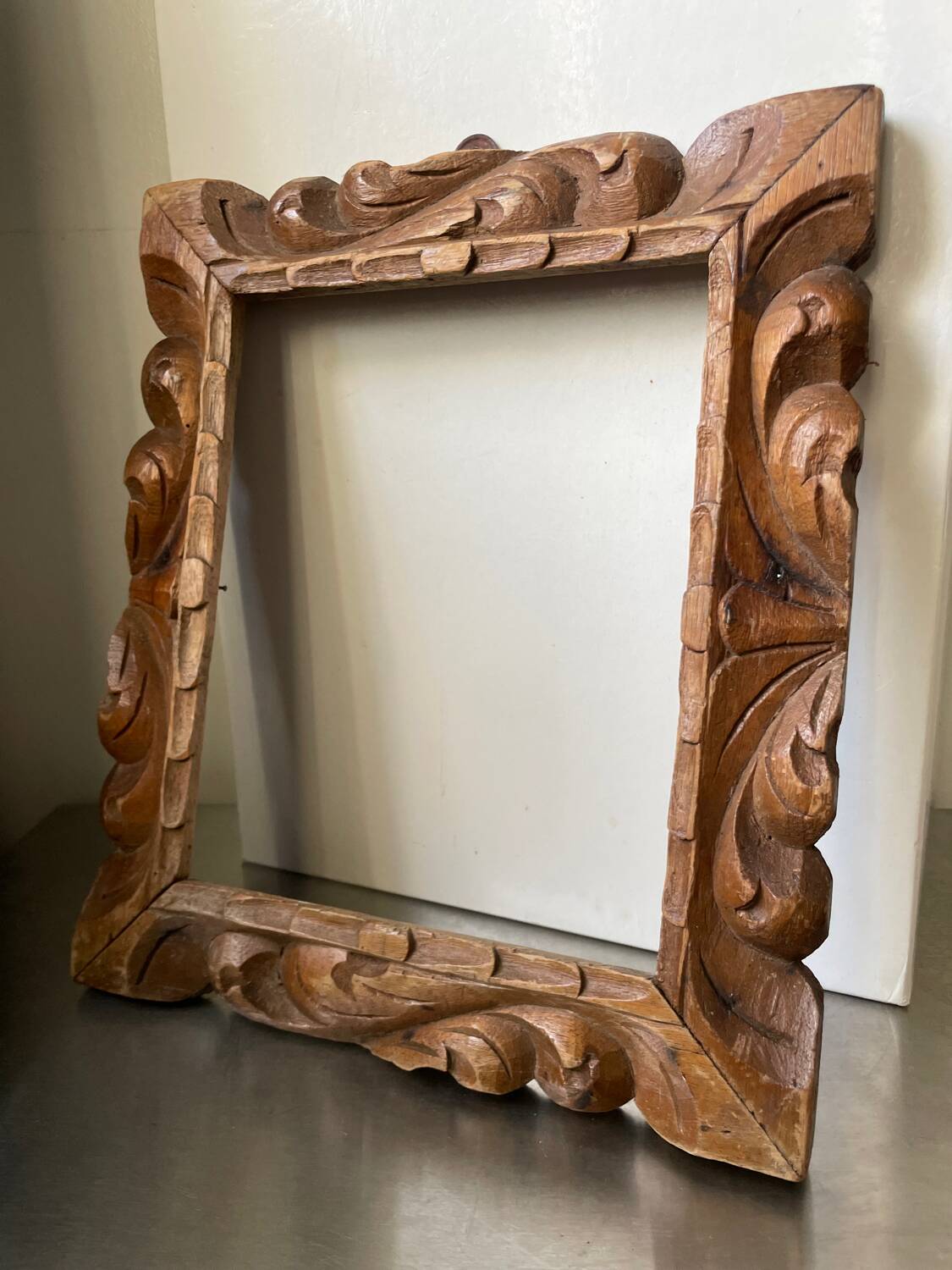 Antique handcarved frame   solid wood 33.5  x 29 cm  opening measurements 23.5 cm x 19 cm cedar wood