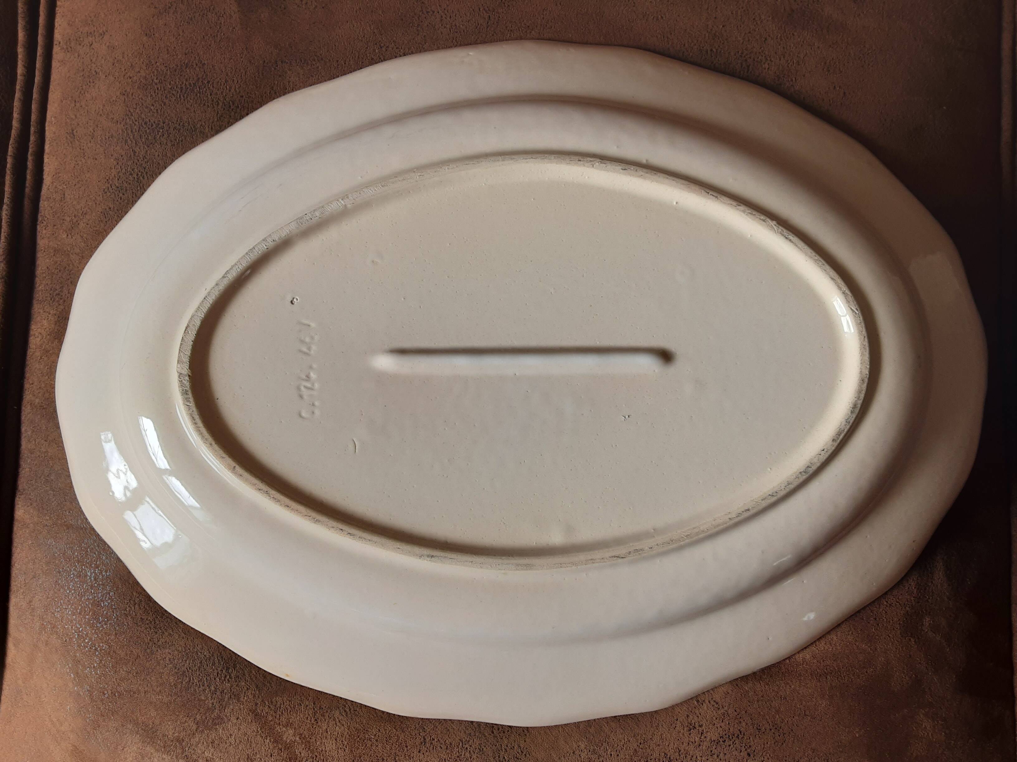 Oval ceramic dish in slip style