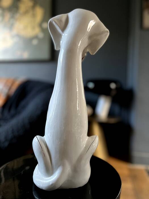 Enameled porcelain dog