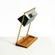 1960s Temde table lamp with a brass frame, teak base, and green lampshade
