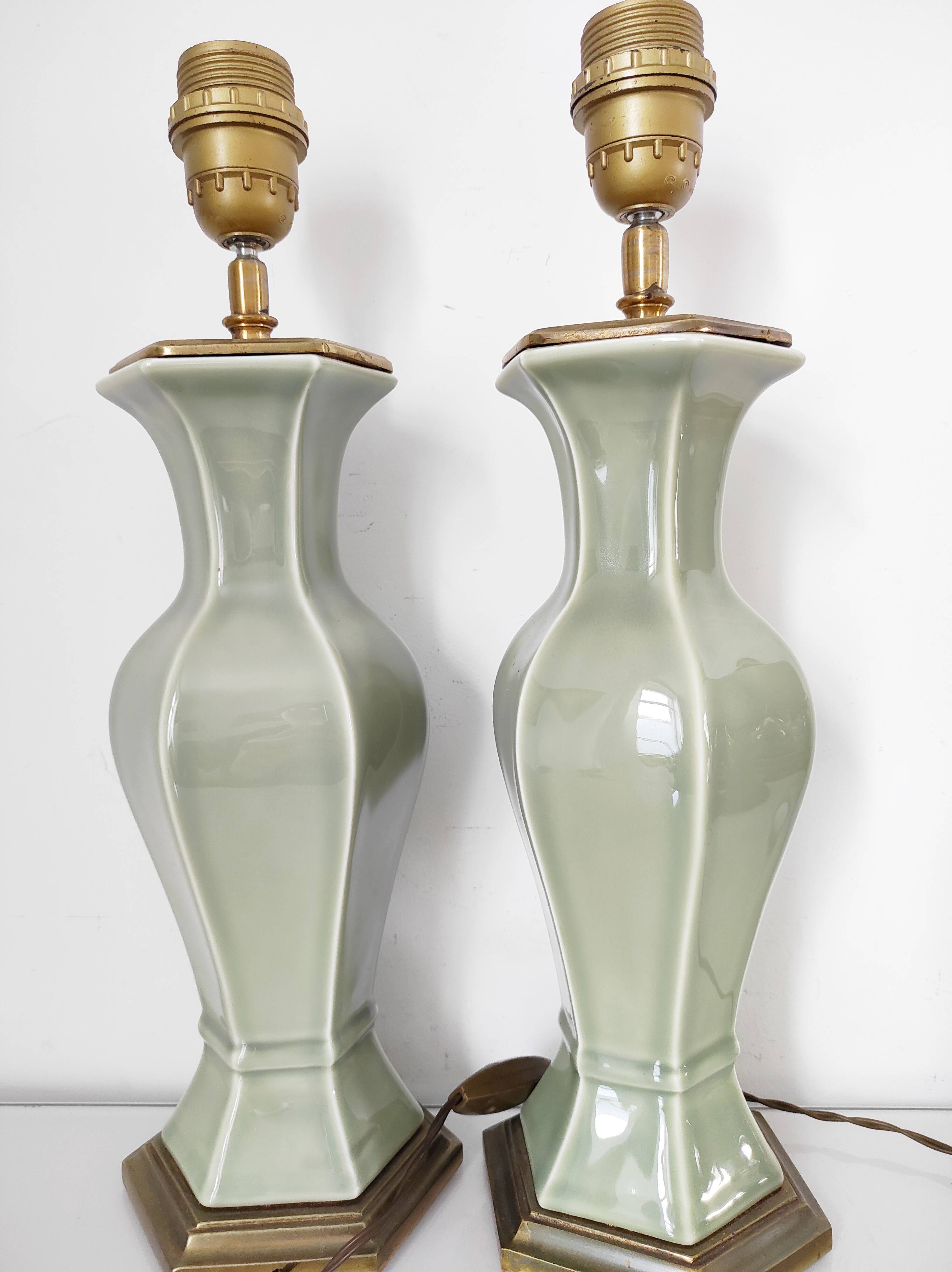 Two celadon-colored ceramic lamp bases