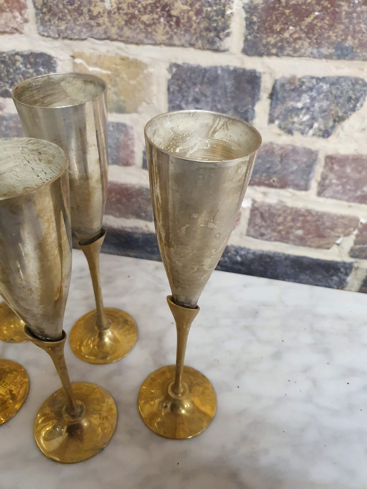 Lot of 11 brass champagne flutes